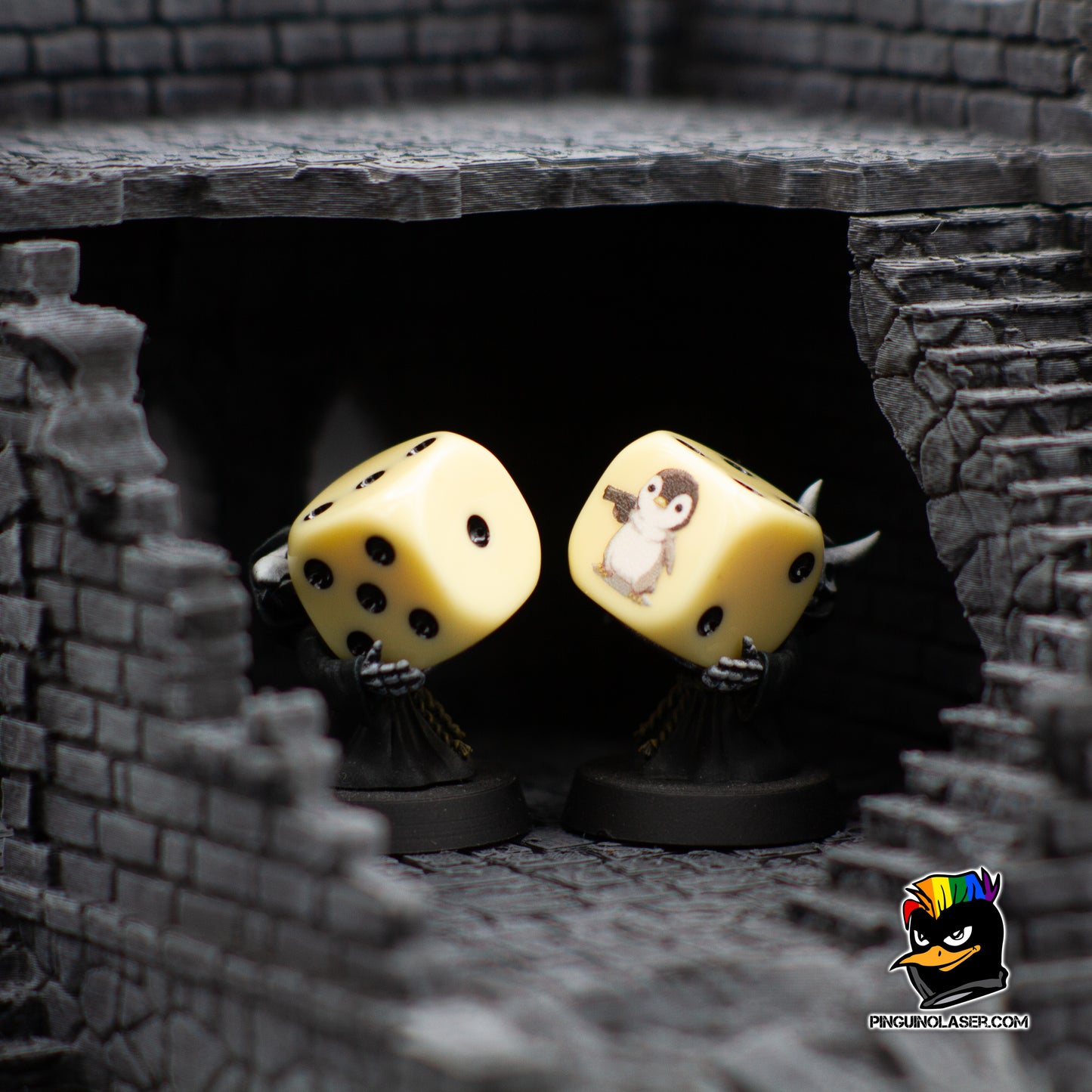 Dado Pinguino pistolero