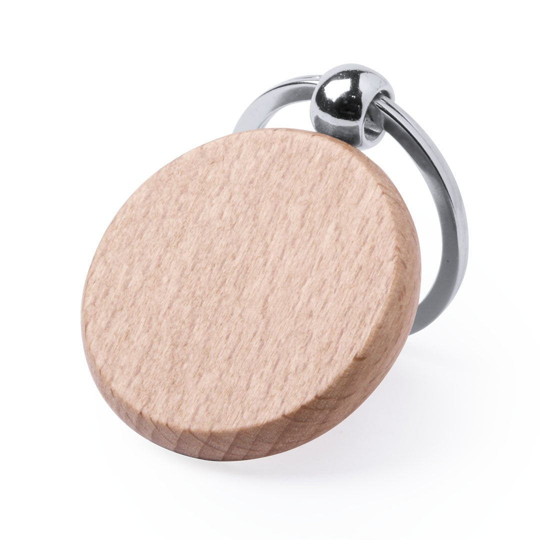Llavero personalizado de madera natural en forma circular.