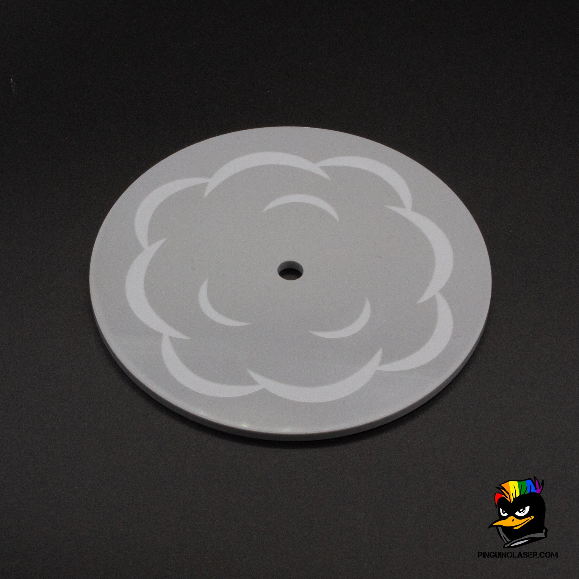 Foto plantilla de humo en metacrilato gris sólido. Tiene forma redonda y grabado de nube de humo.